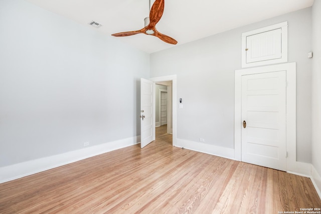 empty room with light hardwood / wood-style floors