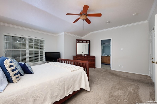 carpeted bedroom with ceiling fan, ensuite bathroom, lofted ceiling, and ornamental molding