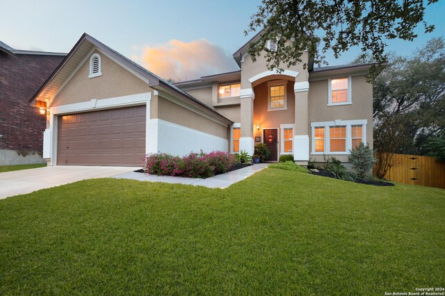 view of front of property with a yard