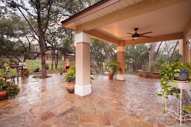 patio terrace at dusk with ceiling fan