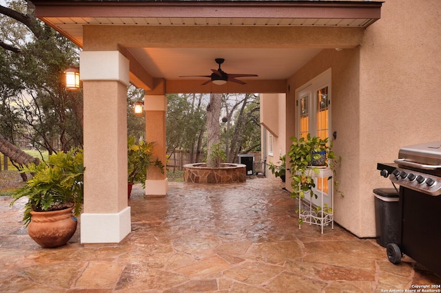 view of patio / terrace featuring ceiling fan