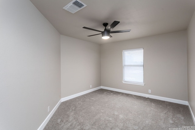 empty room with carpet and ceiling fan