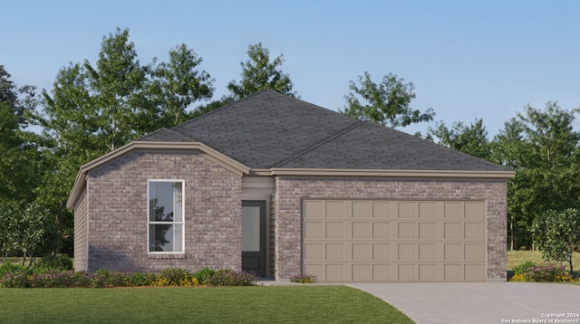 ranch-style home featuring a front yard and a garage