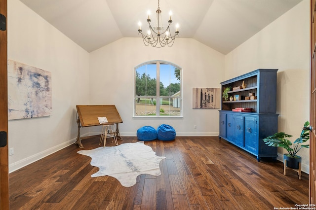 sitting room with a chandelier, dark hardwood / wood-style flooring, and vaulted ceiling