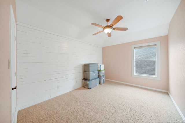 unfurnished room with carpet and ceiling fan