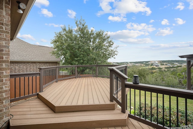 deck featuring a lawn