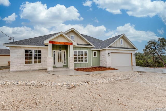 craftsman-style home with a garage