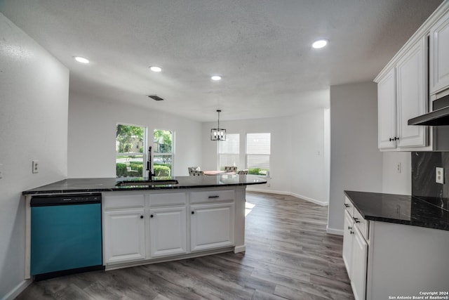 kitchen with white cabinets, stainless steel dishwasher, dark wood-type flooring, and sink