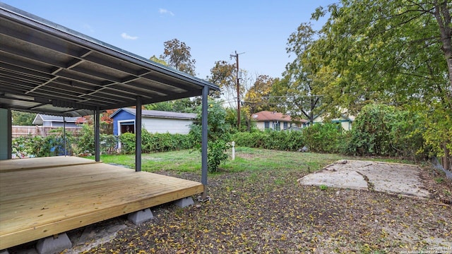 view of yard with a deck