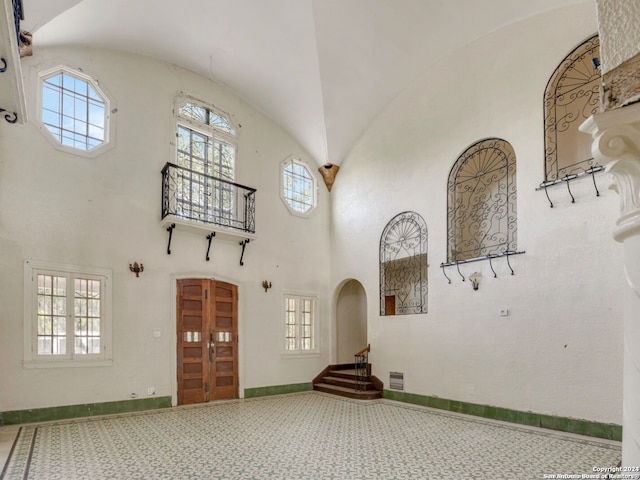 interior space featuring high vaulted ceiling