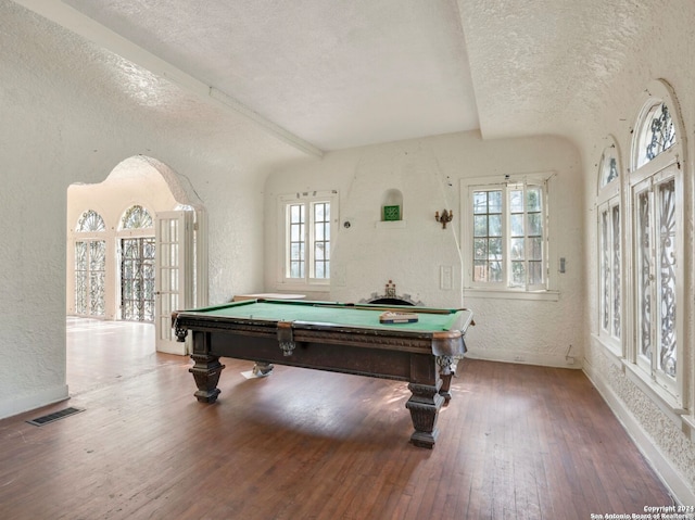 recreation room with a textured ceiling, hardwood / wood-style flooring, and pool table