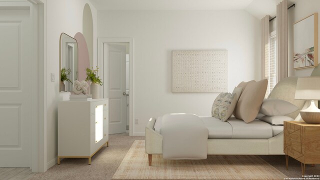 sitting room featuring light carpet and vaulted ceiling