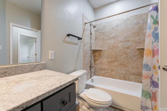 full bathroom with vanity, shower / bath combination with curtain, and toilet