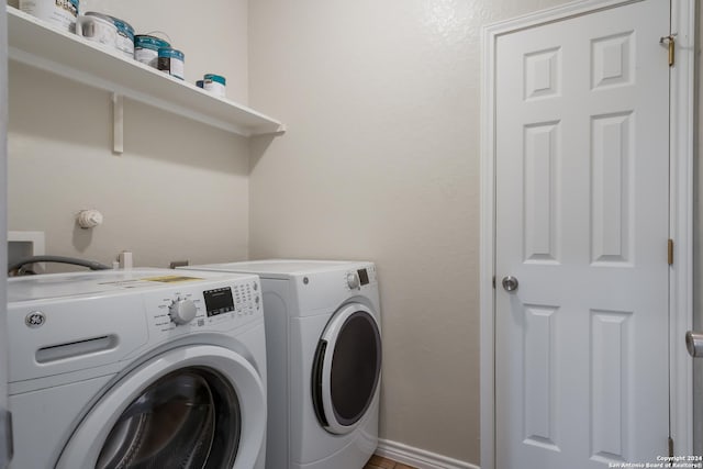 laundry room with washer and dryer