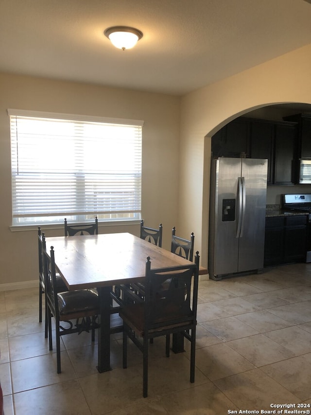 dining room featuring light tile patterned flooring