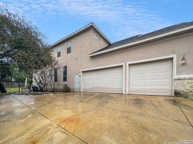 view of home's exterior with a garage