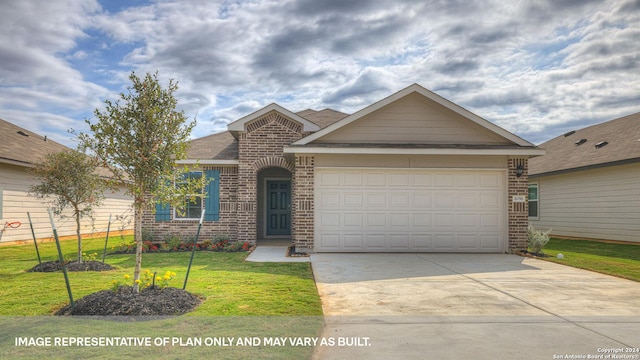 view of front of property featuring a front lawn and a garage