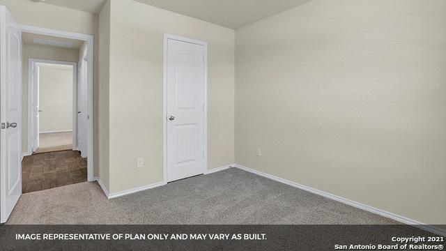 unfurnished bedroom featuring carpet