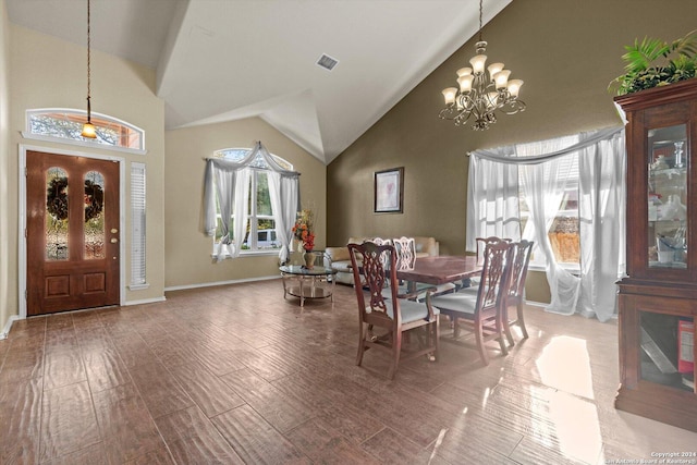 dining area featuring high vaulted ceiling, a chandelier, and hardwood / wood-style flooring