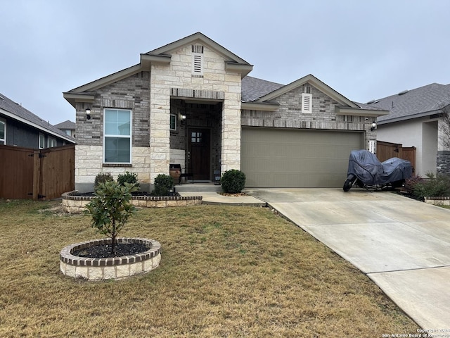 view of front facade featuring a front lawn and a garage