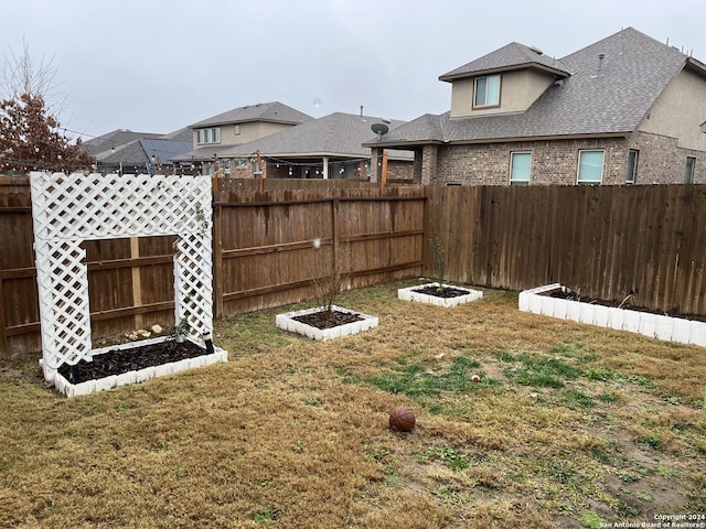 12142 Casparis, San Antonio, TX 78254 - view of yard with a garden
