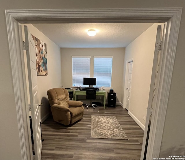 12142 Casparis, San Antonio, TX 78254 - office with wood finished floors, baseboards, and a textured ceiling