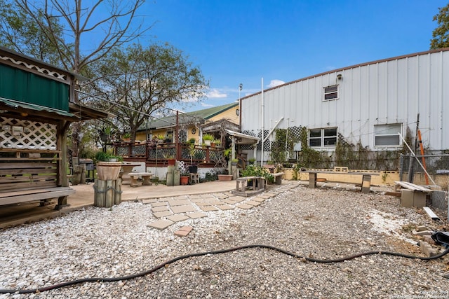 view of yard with a patio and a deck