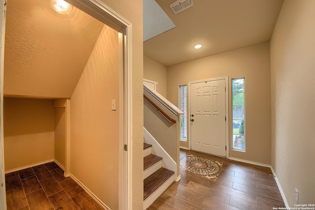 entrance foyer featuring dark hardwood / wood-style floors