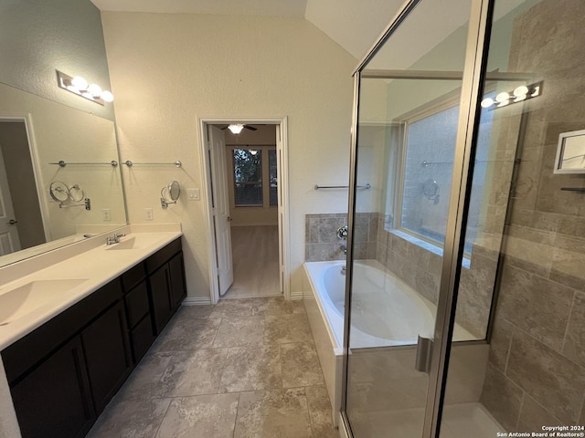 bathroom featuring ceiling fan, vanity, and independent shower and bath