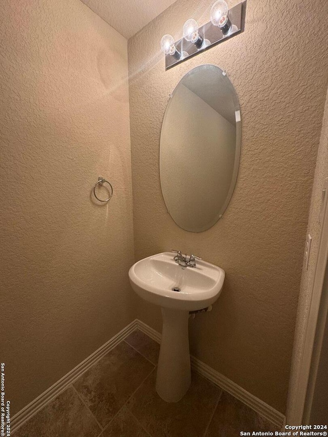 bathroom featuring tile patterned flooring