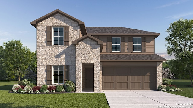 view of front facade with a front yard and a garage