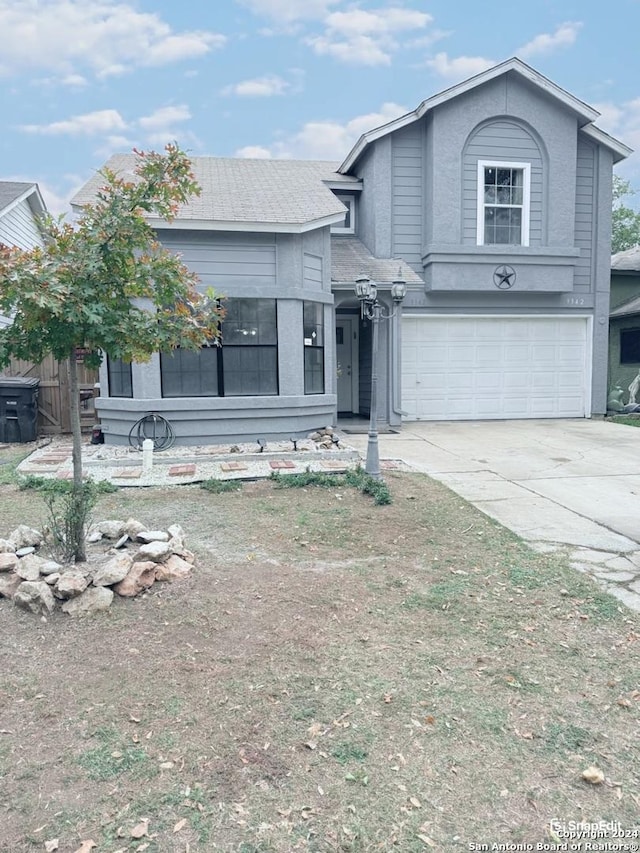 front of property featuring a garage