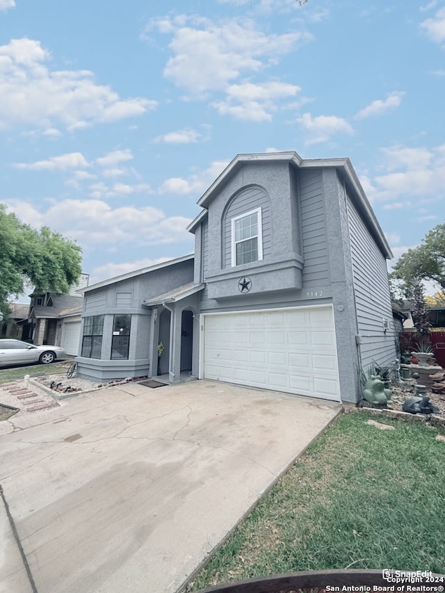 view of front of home featuring a garage