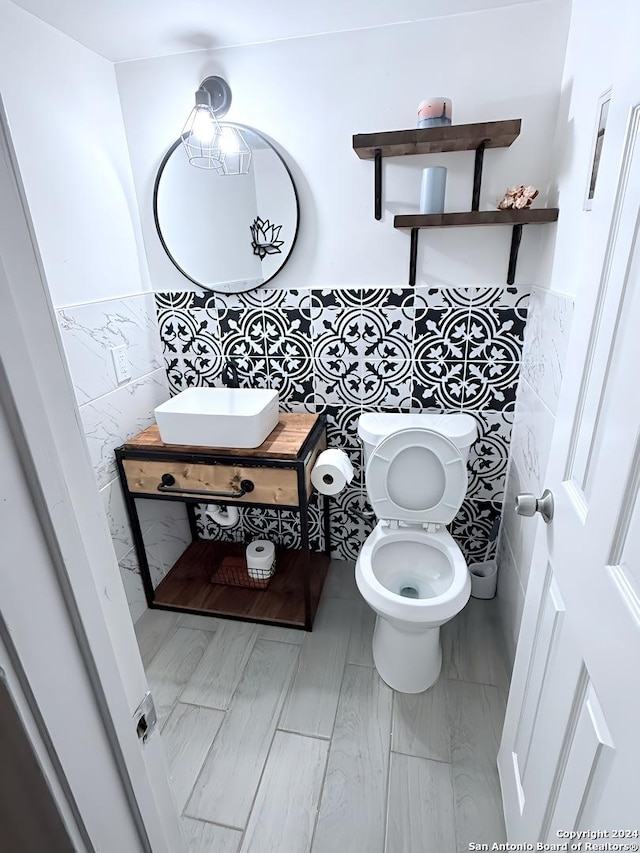 bathroom with toilet and sink