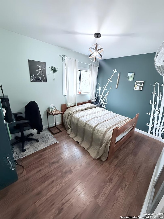 bedroom featuring hardwood / wood-style floors