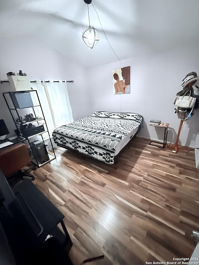 bedroom featuring hardwood / wood-style flooring