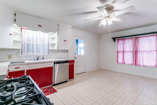 kitchen featuring tasteful backsplash, stainless steel dishwasher, ceiling fan, sink, and white cabinets