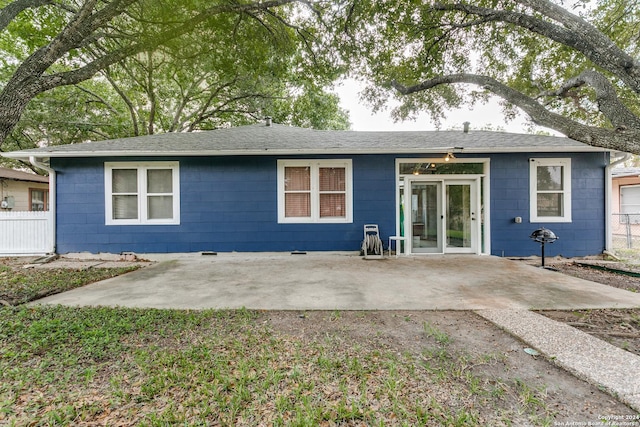 rear view of house featuring a patio