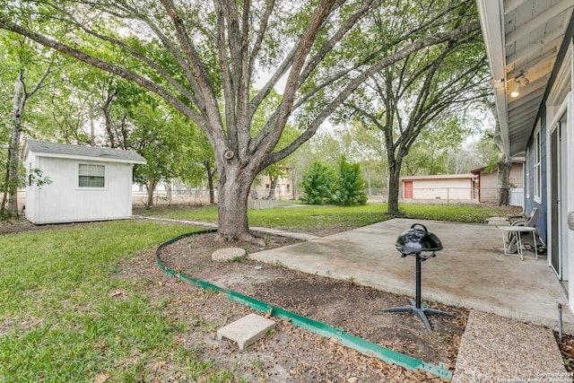 view of yard with a patio area and an outdoor structure