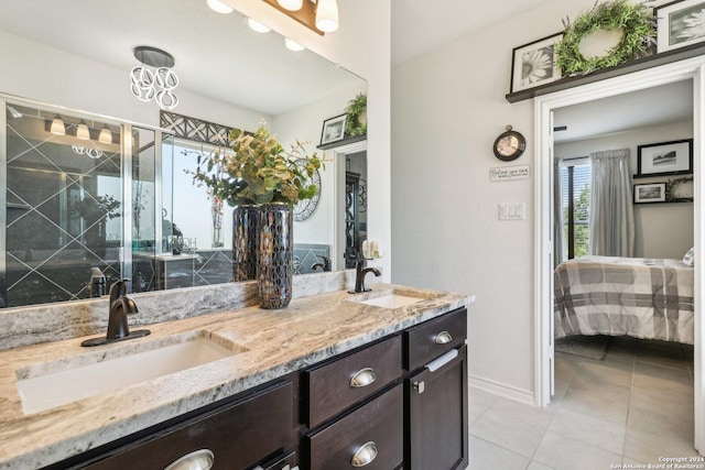 bathroom featuring tile patterned floors and vanity