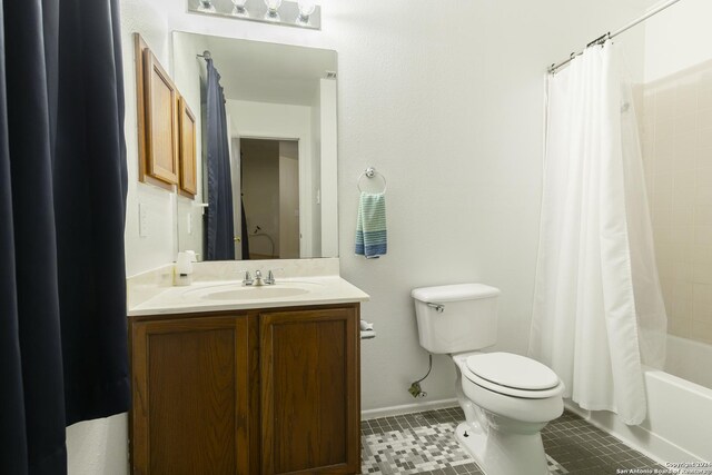 full bathroom featuring tile patterned floors, vanity, toilet, and shower / bathtub combination with curtain