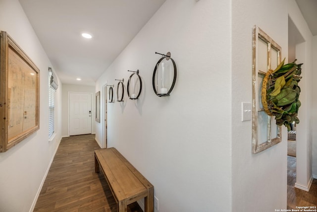 corridor featuring dark hardwood / wood-style floors