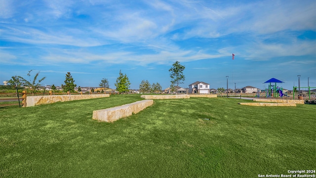 view of yard featuring a playground