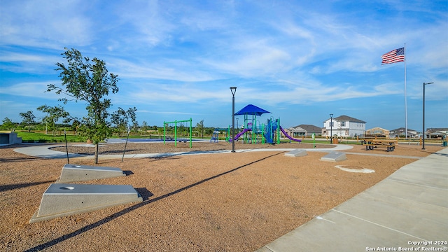 view of community with a playground