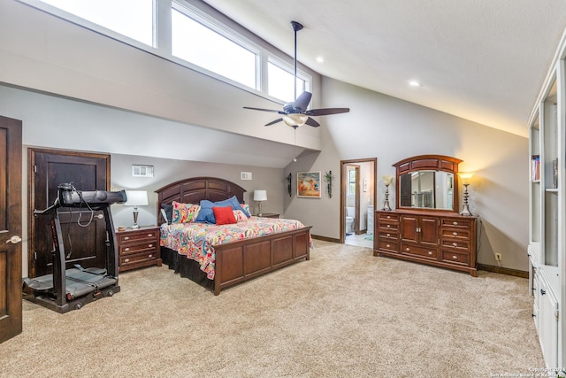 carpeted bedroom with ceiling fan and vaulted ceiling