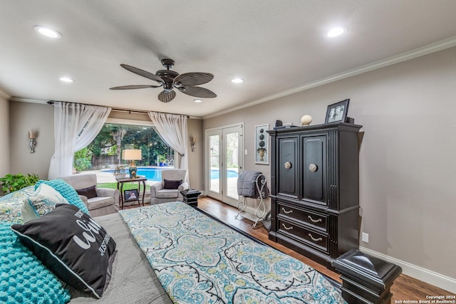 bedroom featuring ceiling fan, french doors, dark hardwood / wood-style floors, access to outside, and ornamental molding