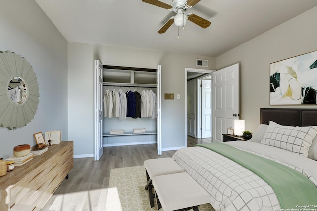 bedroom with a closet, ceiling fan, and light hardwood / wood-style floors