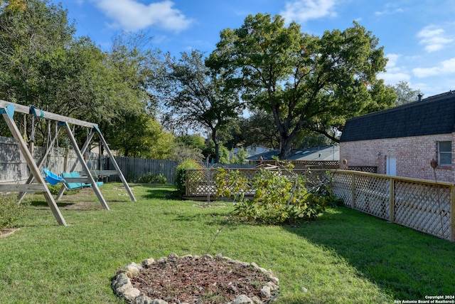 view of yard featuring a playground