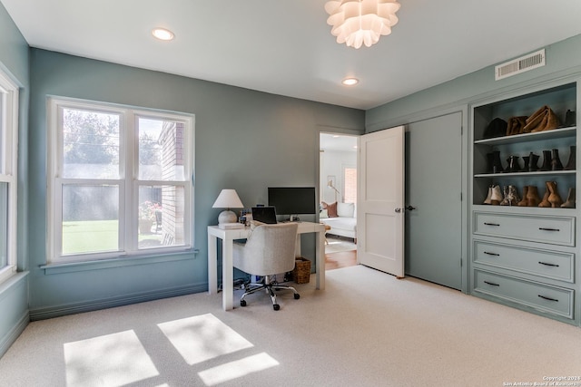 view of carpeted office space