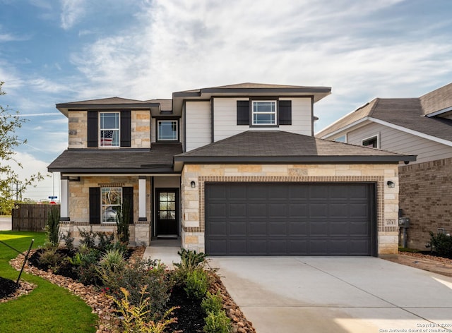 view of front of property featuring a garage